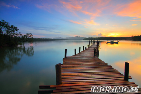 lake dusk dawn dock sun 